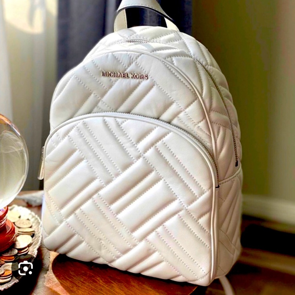 Michael Kors White Quilted Leather Backpack.